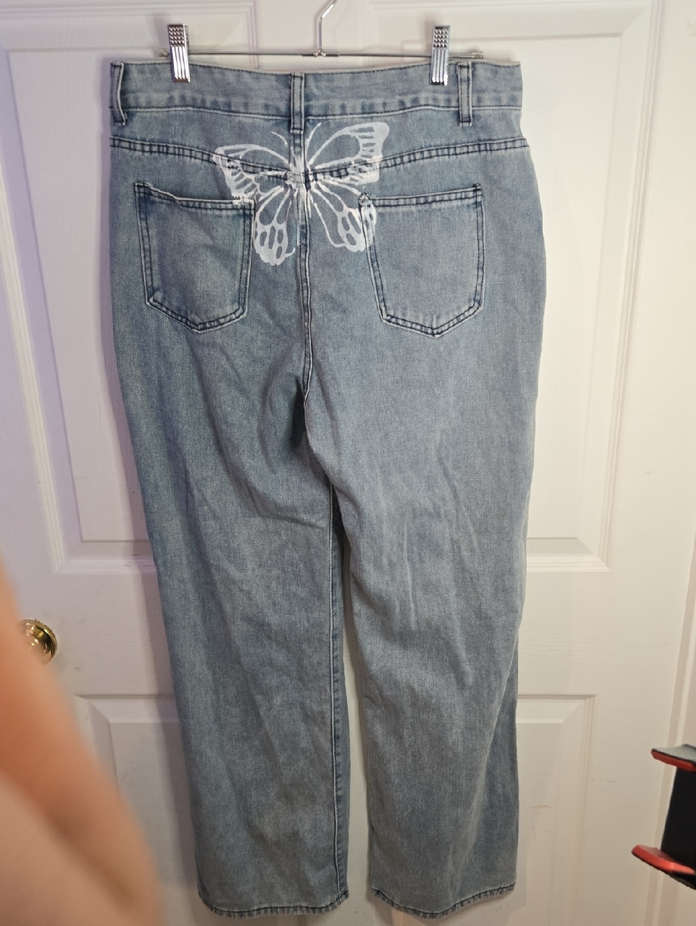 Light Wash Women's Jeans with White Butterfly Detail